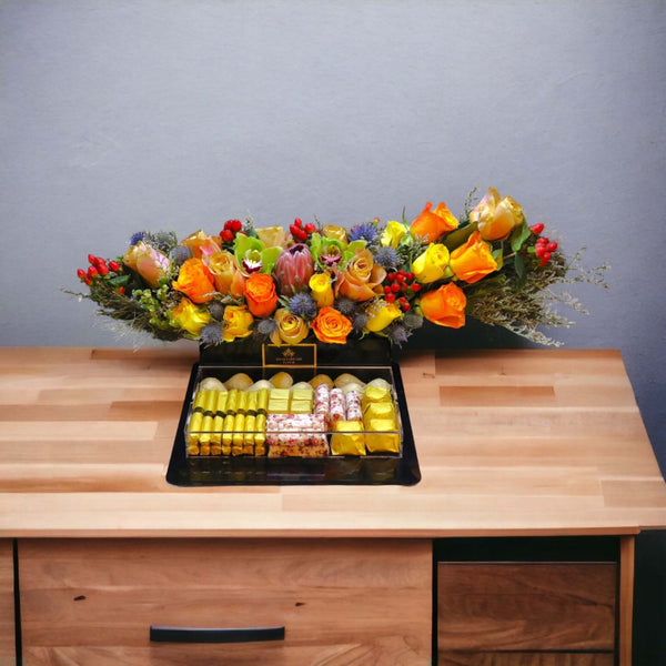Cheerful Flower Arrangement with Chocolates
