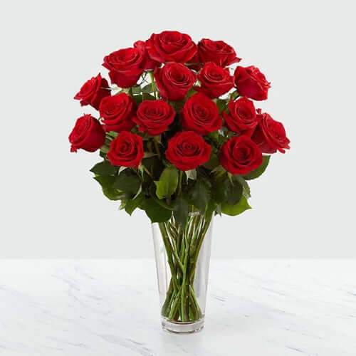 Order 24 Red Roses in Glass Vase for Same-day Delivery in Sharjah