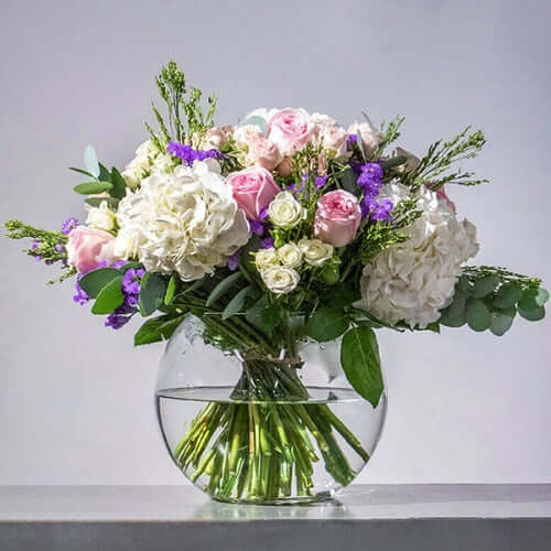Elegant Centerpiece Flower Arrangement in Fish Bowl